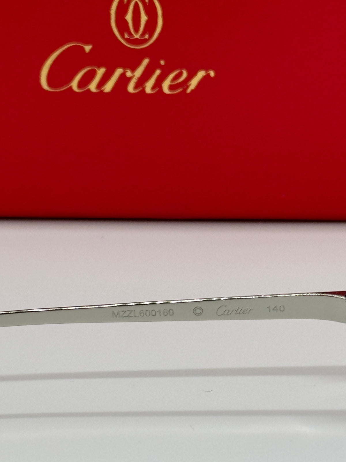 Cartier Panthere CT0474S Silver Photochromic