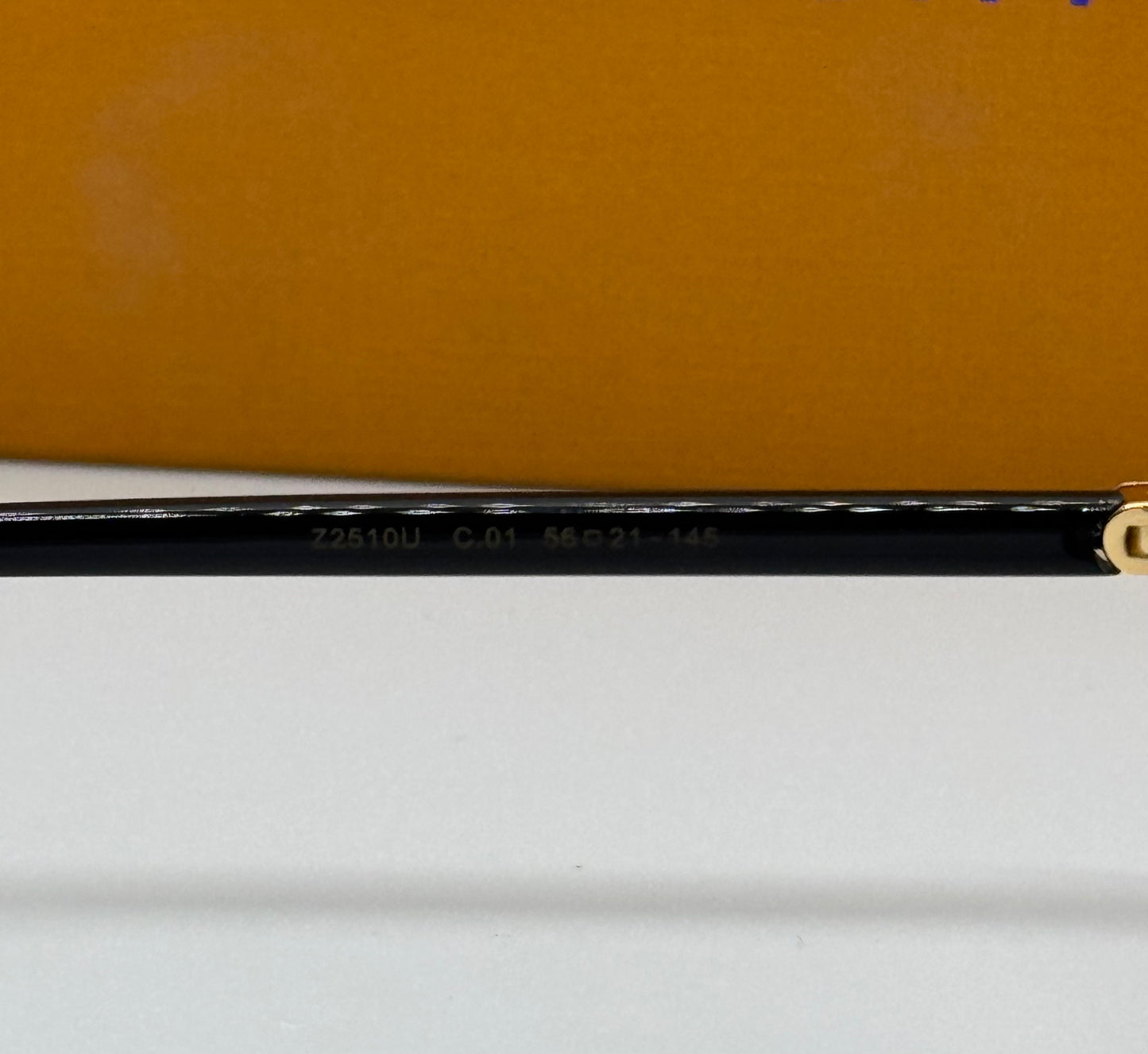 Louis Vuitton LV Signature Black x Gold