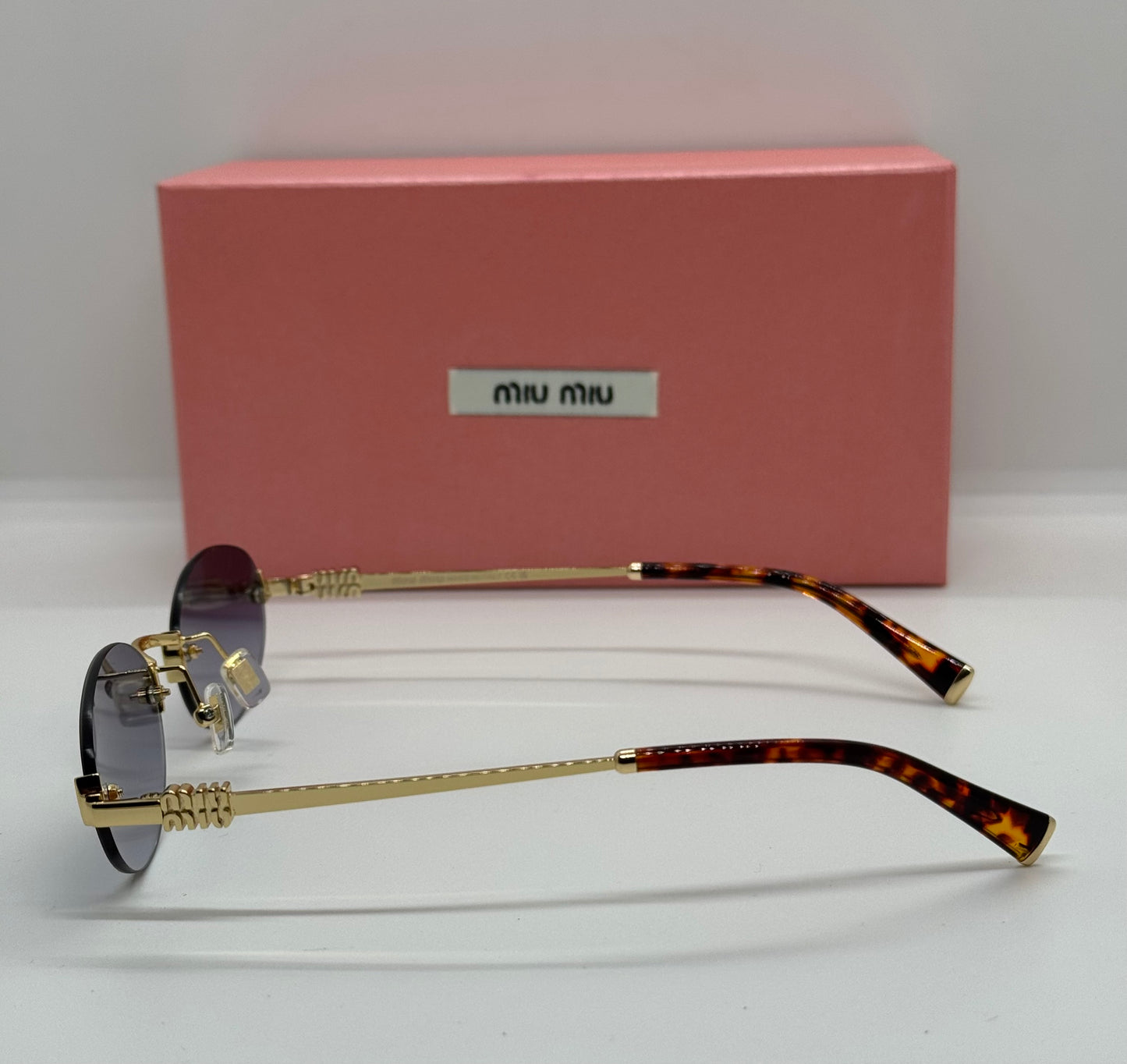 Miu Miu Logo Oval MUA54S Gradient