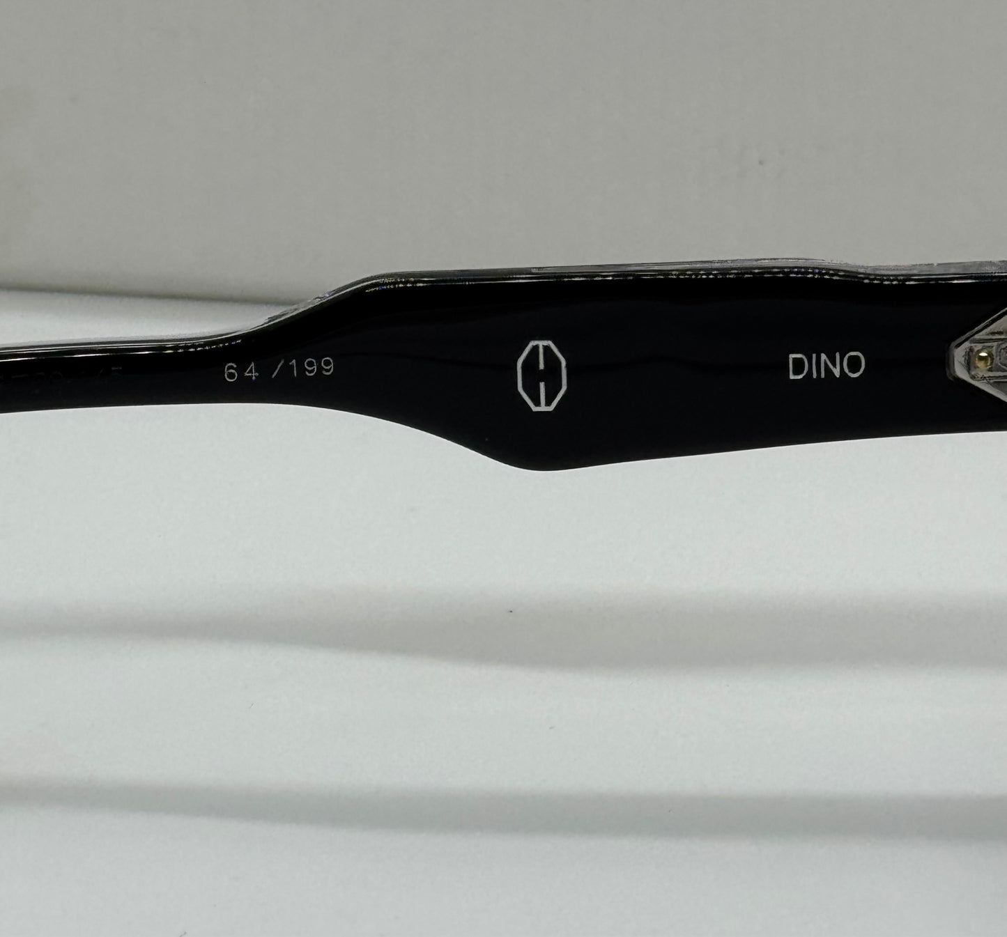 T Henri Dino Black Frame