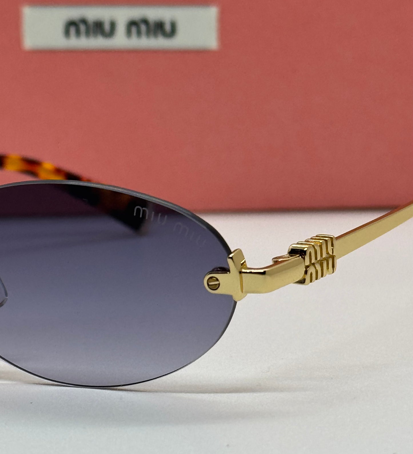 Miu Miu Logo Oval MUA54S Gradient