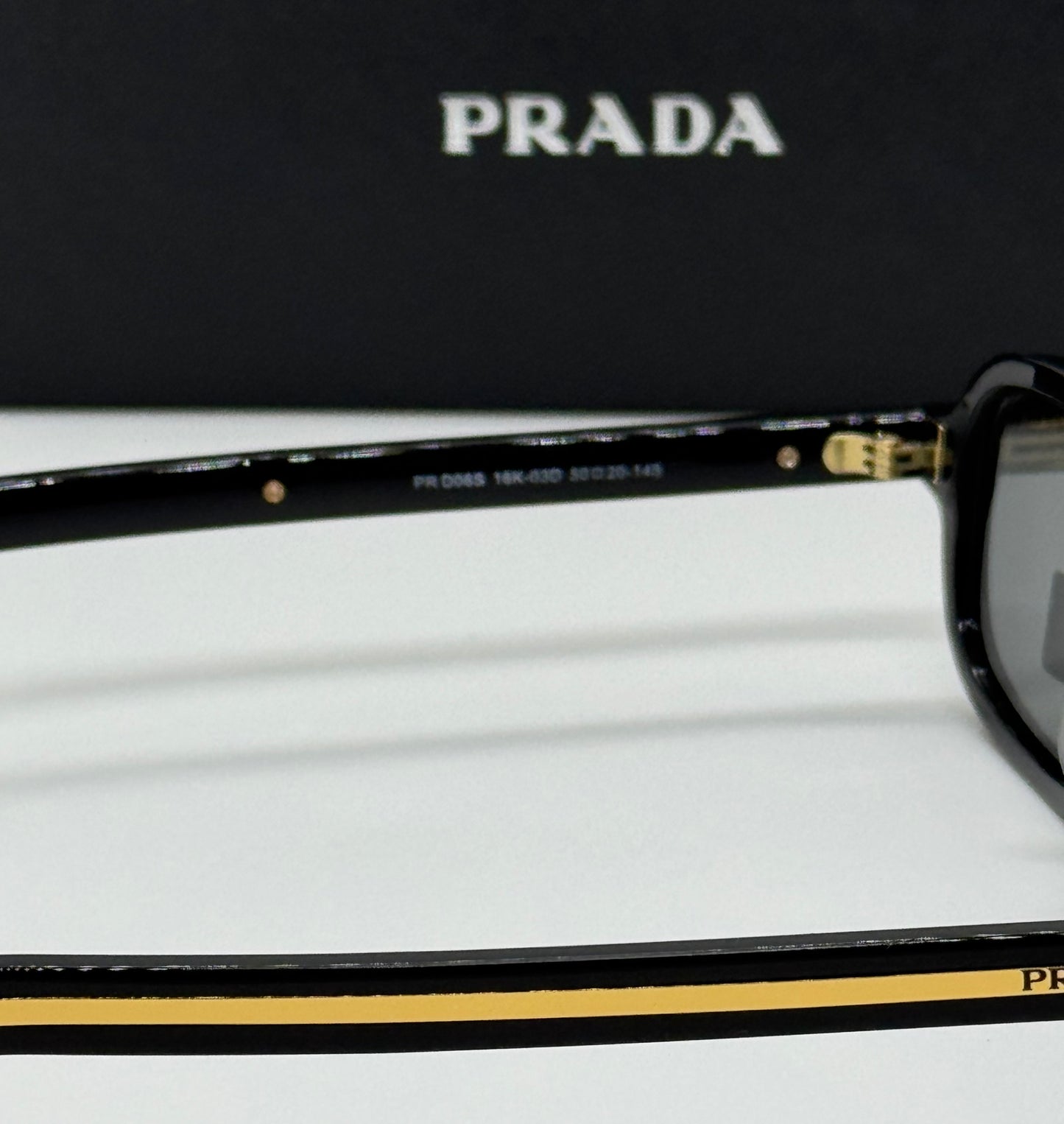 Prada PR D06S Black x Gold