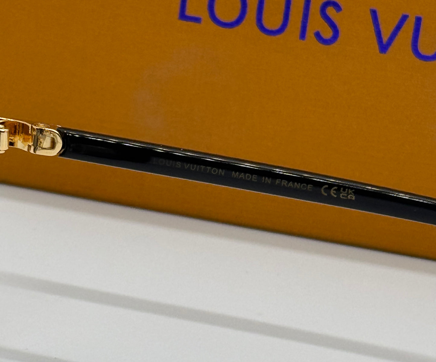 Louis Vuitton LV Signature Black x Gold